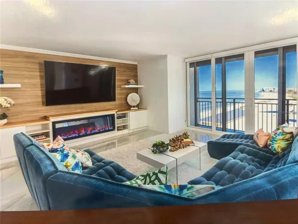 a living room with furniture and a couch