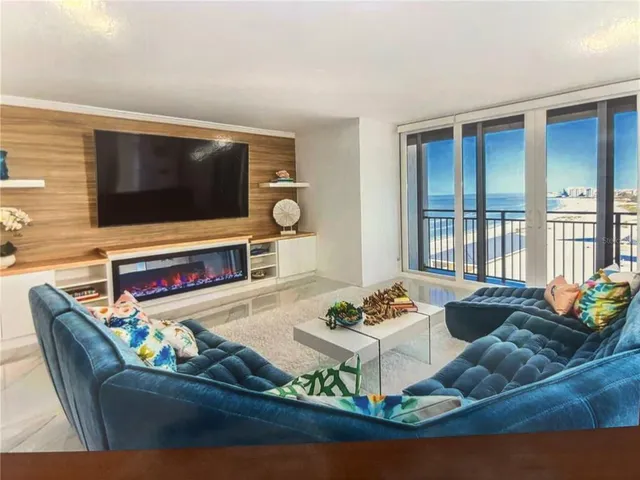 a living room with furniture and a couch