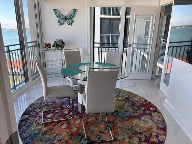 a bedroom with a bed and a mirror