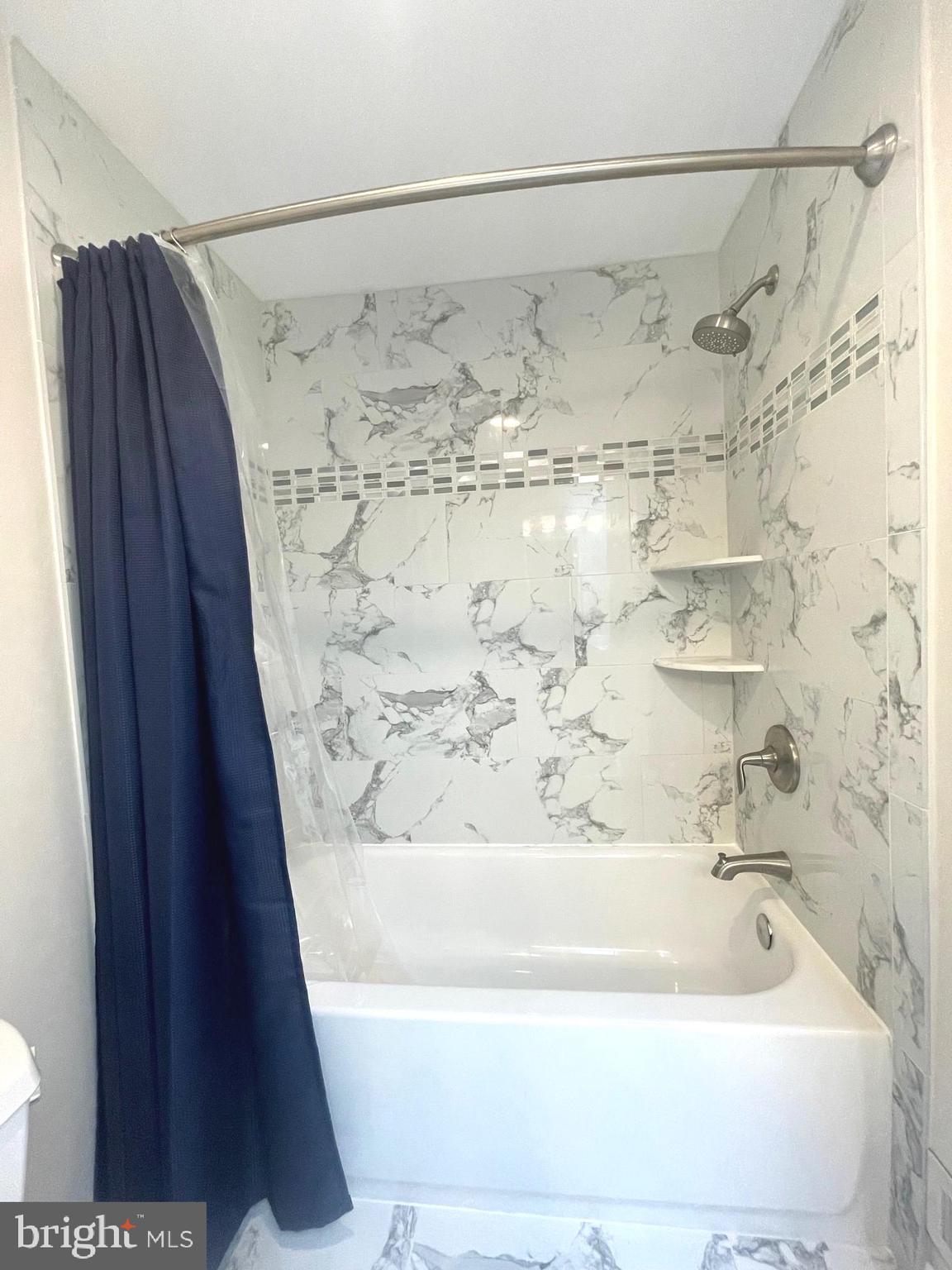2119 Whisper Way Reston, VA 20191 - Photo 14 of 17 a bathroom with a bathtub and shower