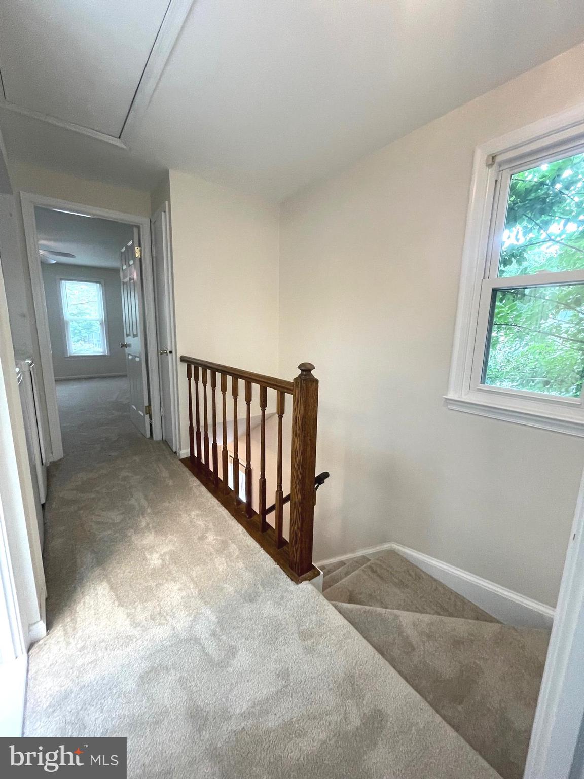 2119 Whisper Way Reston, VA 20191 - Photo 10 of 17 a view of a hallway with a window