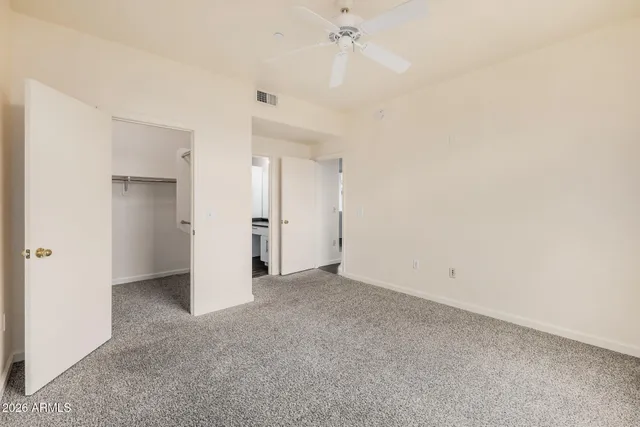 a view of an empty walk in closet