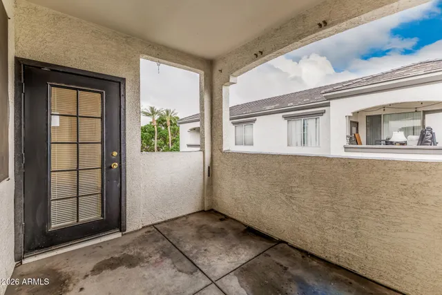 a view of a backyard with couches