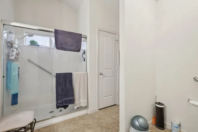 a view of a livingroom with furniture and windows