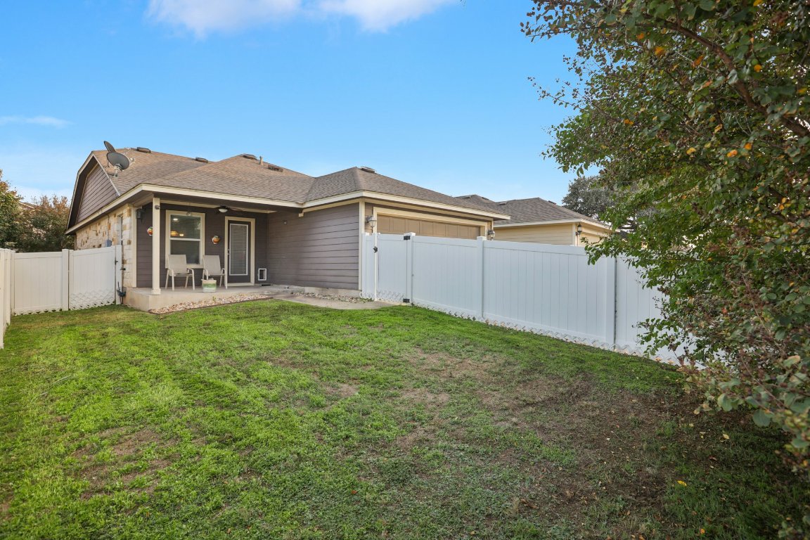 1621 Big Thicket Drive Cedar Park, TX 78613 - Photo 29 of 37 a view of a house with a big yard and large tree