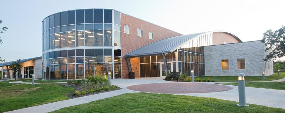 1621 Big Thicket Drive Cedar Park, TX 78613 - Photo 36 of 37 a front view of a house with a garden
