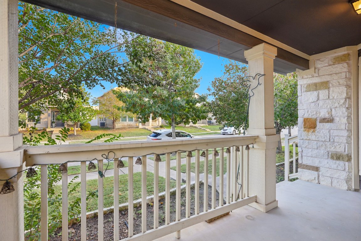 1621 Big Thicket Drive Cedar Park, TX 78613 - Photo 4 of 37 a view of a balcony with wooden floor