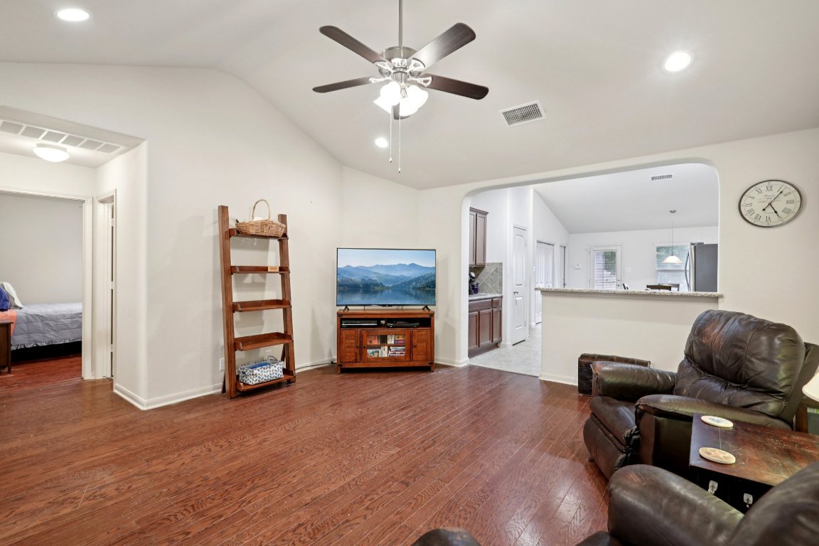 1621 Big Thicket Drive Cedar Park, TX 78613 - Photo 8 of 37 a living room with furniture and a flat screen tv