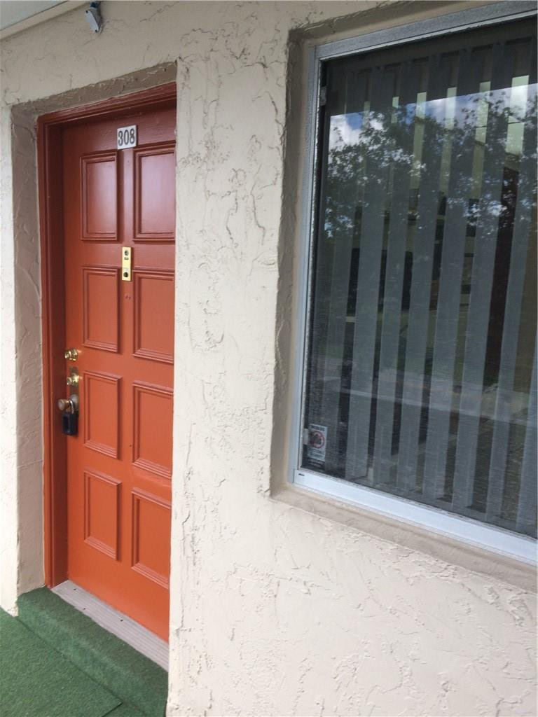 3571 Inverrary Drive, Unit 308 Lauderhill, FL 33319 - Photo 1 of 9 view of wooden door