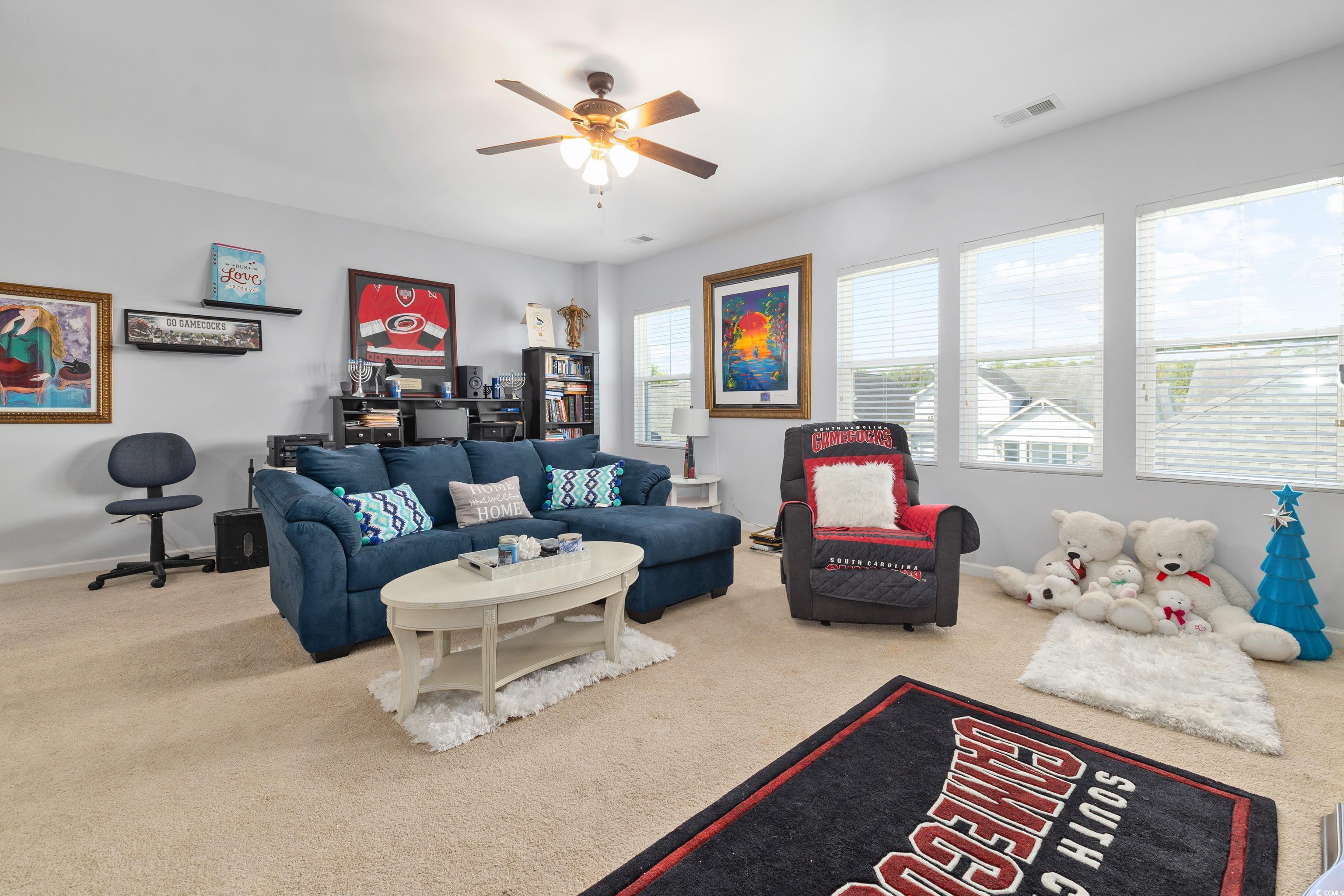 2360 Heritage Loop, Unit 2360 Myrtle Beach, SC 29577 - Photo 29 of 38 Living room with carpet and a ceiling fan