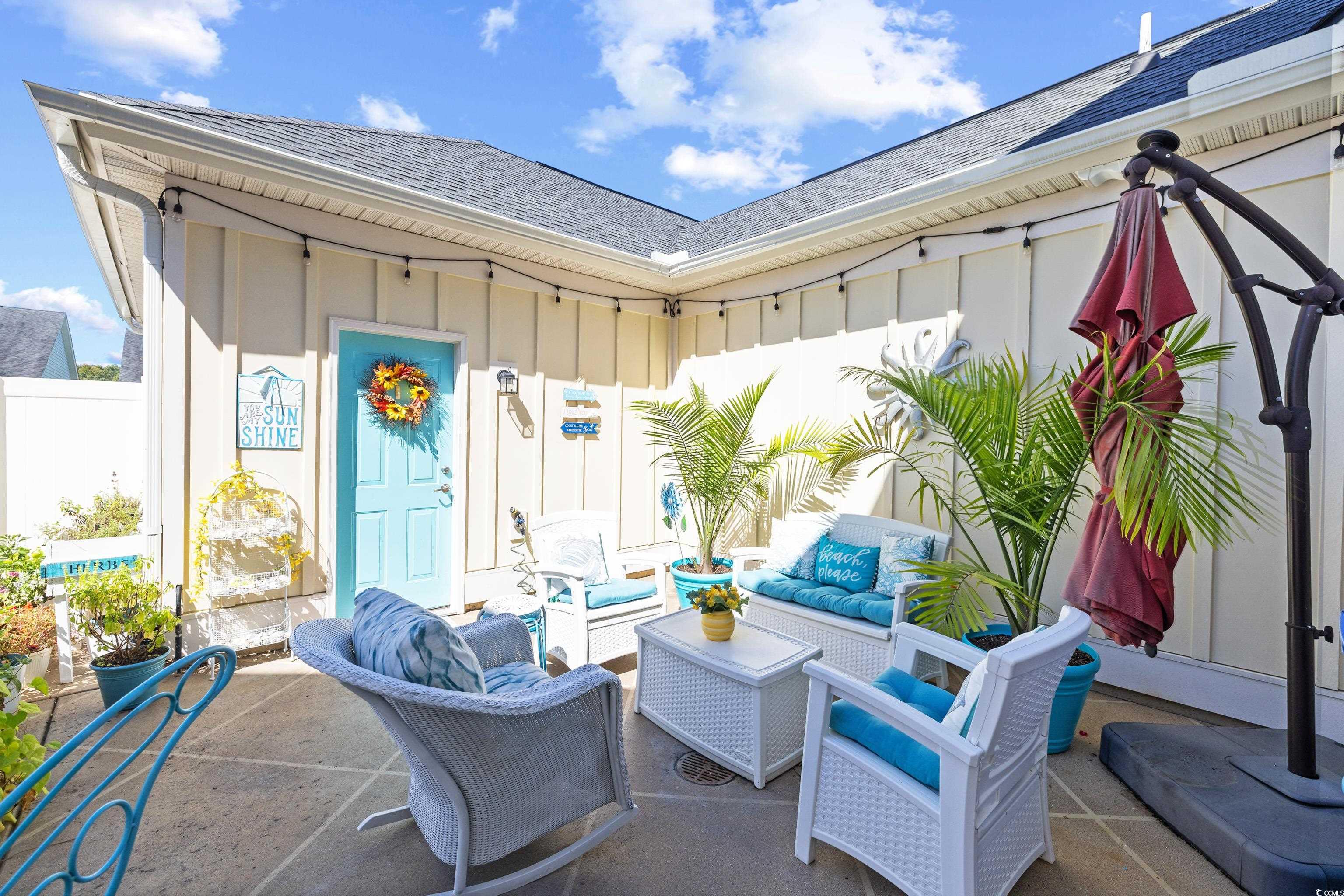 2360 Heritage Loop, Unit 2360 Myrtle Beach, SC 29577 - Photo 7 of 38 View of patio / terrace featuring an outdoor living space