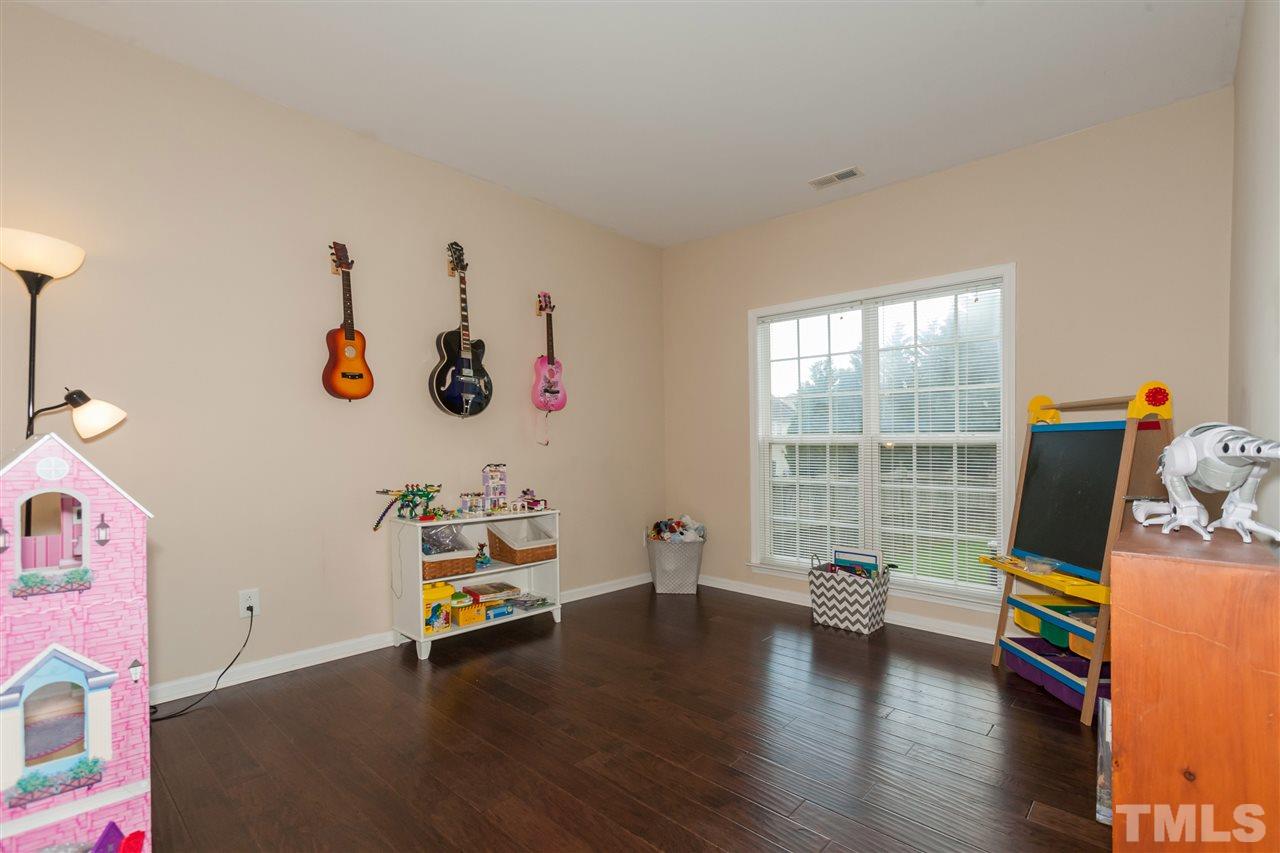 7613 Silver View Lane Raleigh, NC 27613 - Photo 11 of 25 This room is tucked away on the first floor and features double french doors. You can use as these owners have as a first floor playroom or use it as a hobby room, office, game room, fitness room, music room, etc.