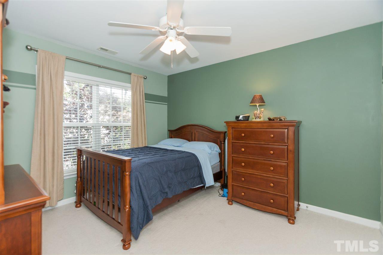 7613 Silver View Lane Raleigh, NC 27613 - Photo 16 of 25 One of three spacious secondary bedrooms.