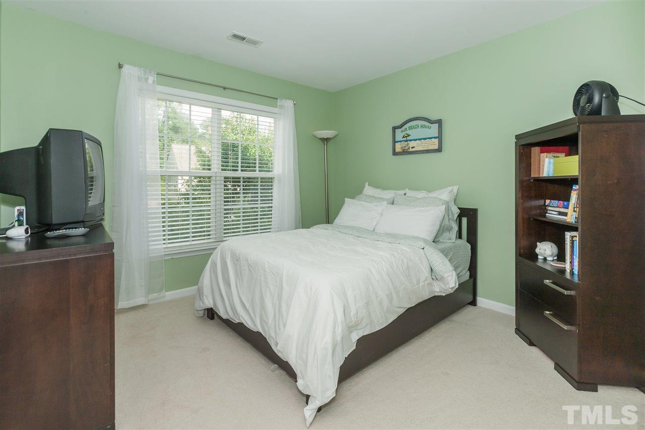 7613 Silver View Lane Raleigh, NC 27613 - Photo 17 of 25 One of three spacious secondary bedrooms.