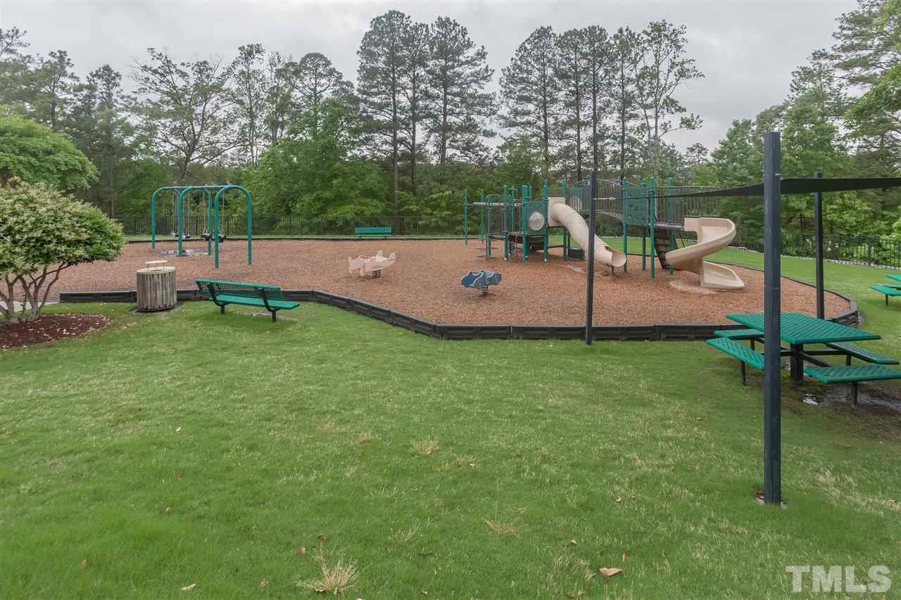 7613 Silver View Lane Raleigh, NC 27613 - Photo 24 of 25 The Long Lake playground is right next to the pool, tennis, and clubhouse.
