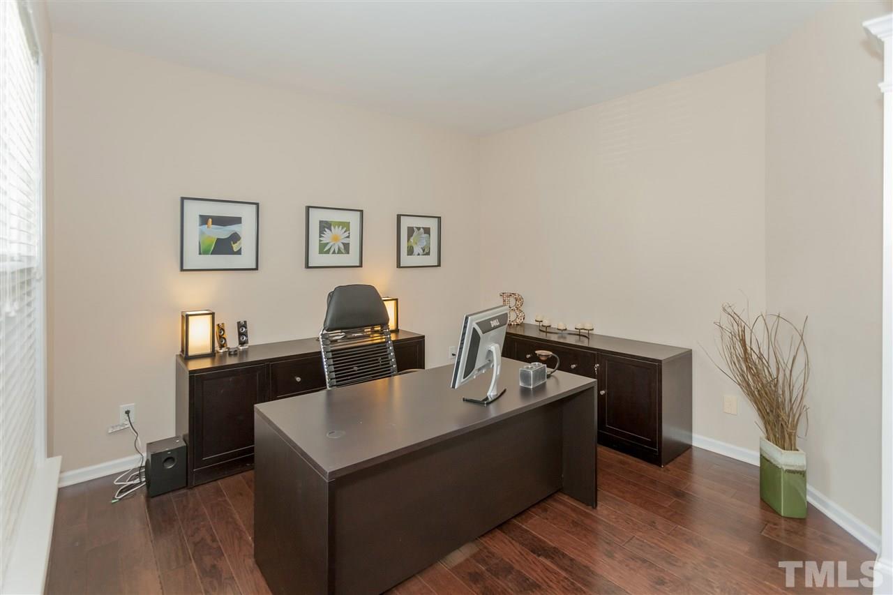 7613 Silver View Lane Raleigh, NC 27613 - Photo 10 of 25 This room is used as an office but could also be a formal living room, music room, or study.