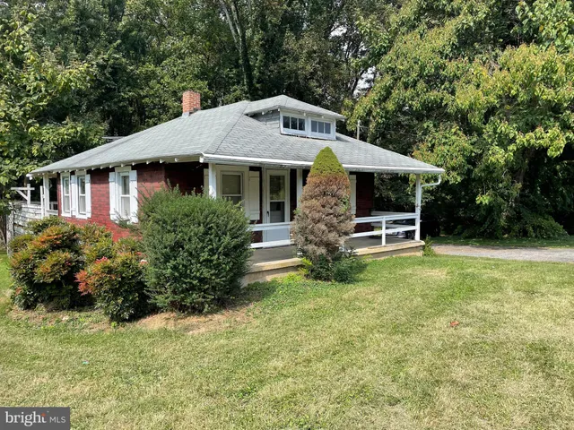 a view of a yard with an outdoor space