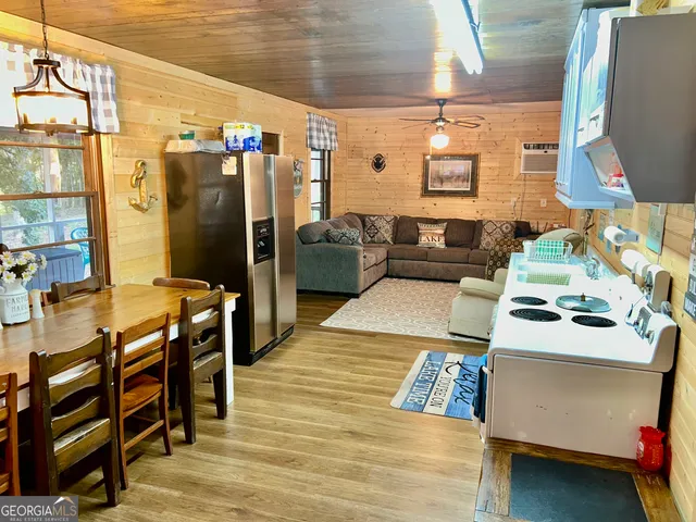 a bedroom with bed and a window