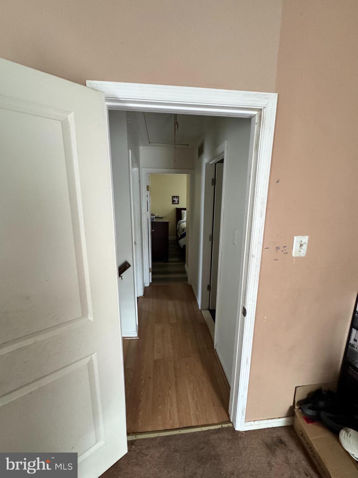 461 Old Erial Road Sicklerville, NJ 08081 - Photo 6 of 34 a view of a hallway with wooden floor and staircase