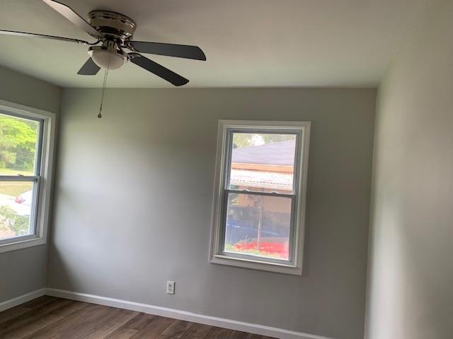 4559 Hendrix Drive Forest Park, GA 30297 - Photo 11 of 24 an empty room with windows and fan