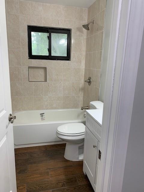 4559 Hendrix Drive Forest Park, GA 30297 - Photo 14 of 24 a bathroom with a toilet a sink and bathtub