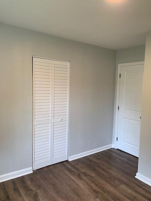 4559 Hendrix Drive Forest Park, GA 30297 - Photo 20 of 24 a view of an empty room with wooden floor