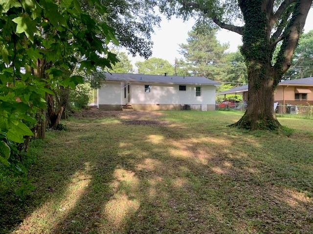 4559 Hendrix Drive Forest Park, GA 30297 - Photo 24 of 24 a view of a house with a tree in a yard
