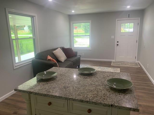 4559 Hendrix Drive Forest Park, GA 30297 - Photo 5 of 24 a kitchen with a granite countertop sink and natural light