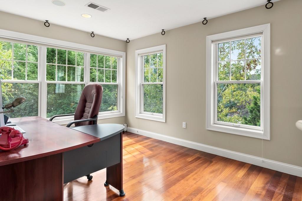 7 Pettees Pond Lane Walpole, MA 02081 - Photo 23 of 38 a view of a workspace with a window