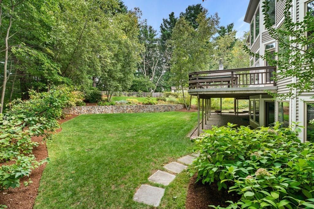 7 Pettees Pond Lane Walpole, MA 02081 - Photo 32 of 38 aerial view of a house with a yard