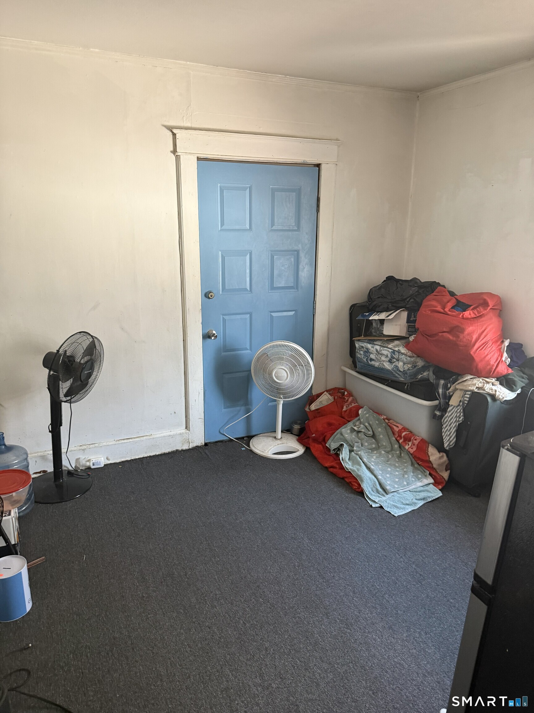 75 Frank Street Stamford, CT 06902 - Photo 12 of 21 a living room with furniture and a window