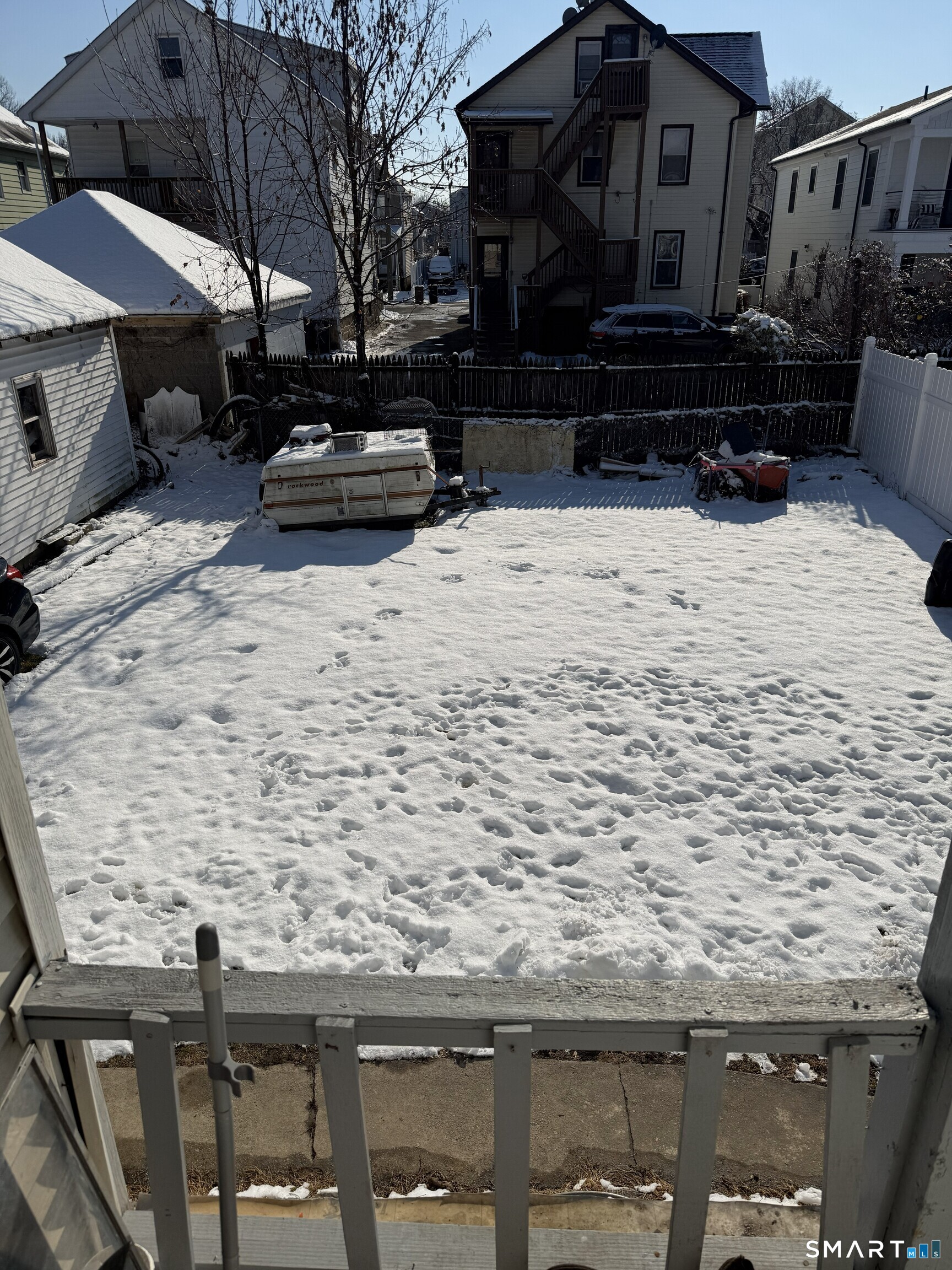 75 Frank Street Stamford, CT 06902 - Photo 17 of 21 a car parked in front of a building