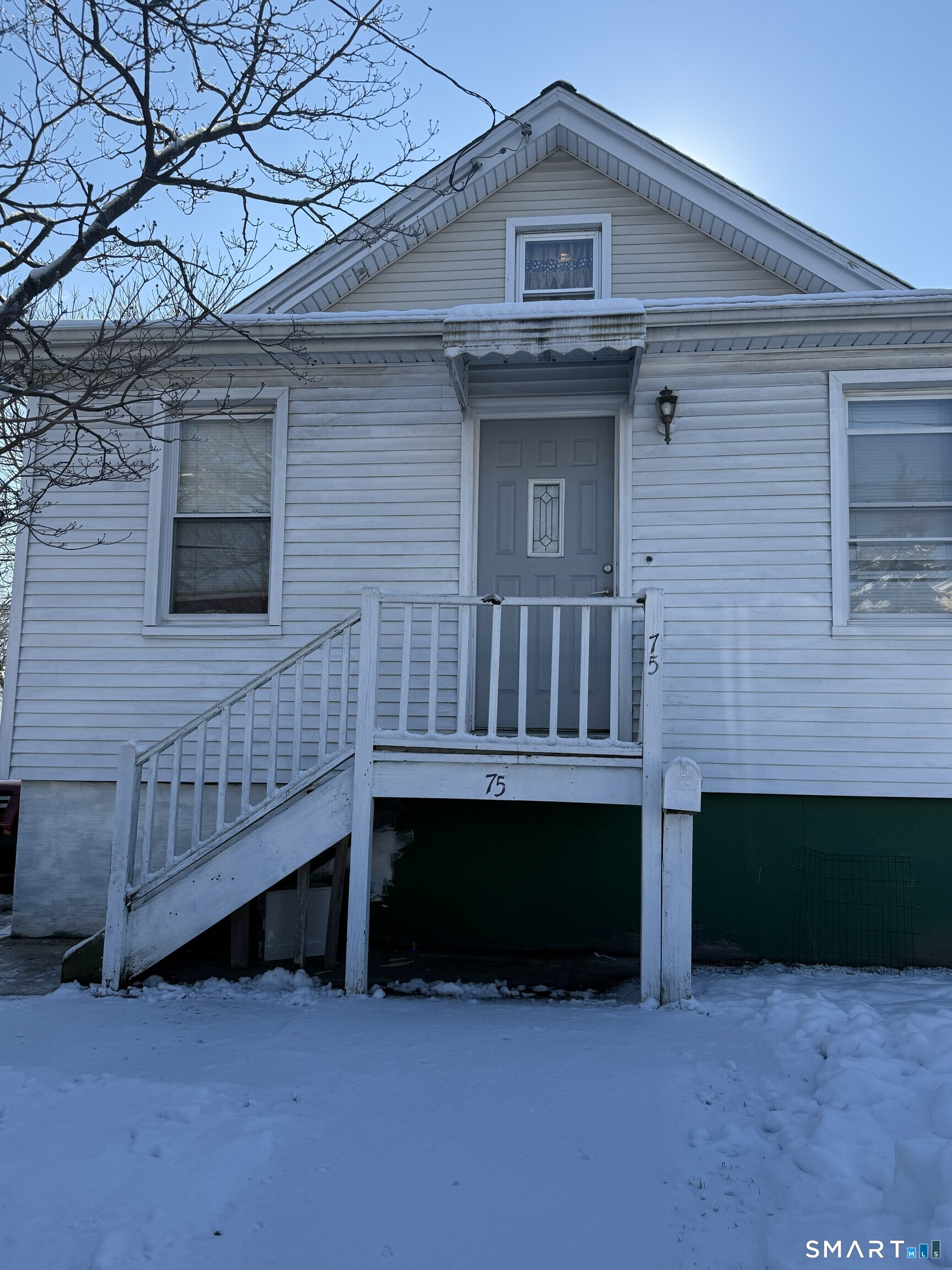75 Frank Street Stamford, CT 06902 - Photo 2 of 21 a view of back yard of the house