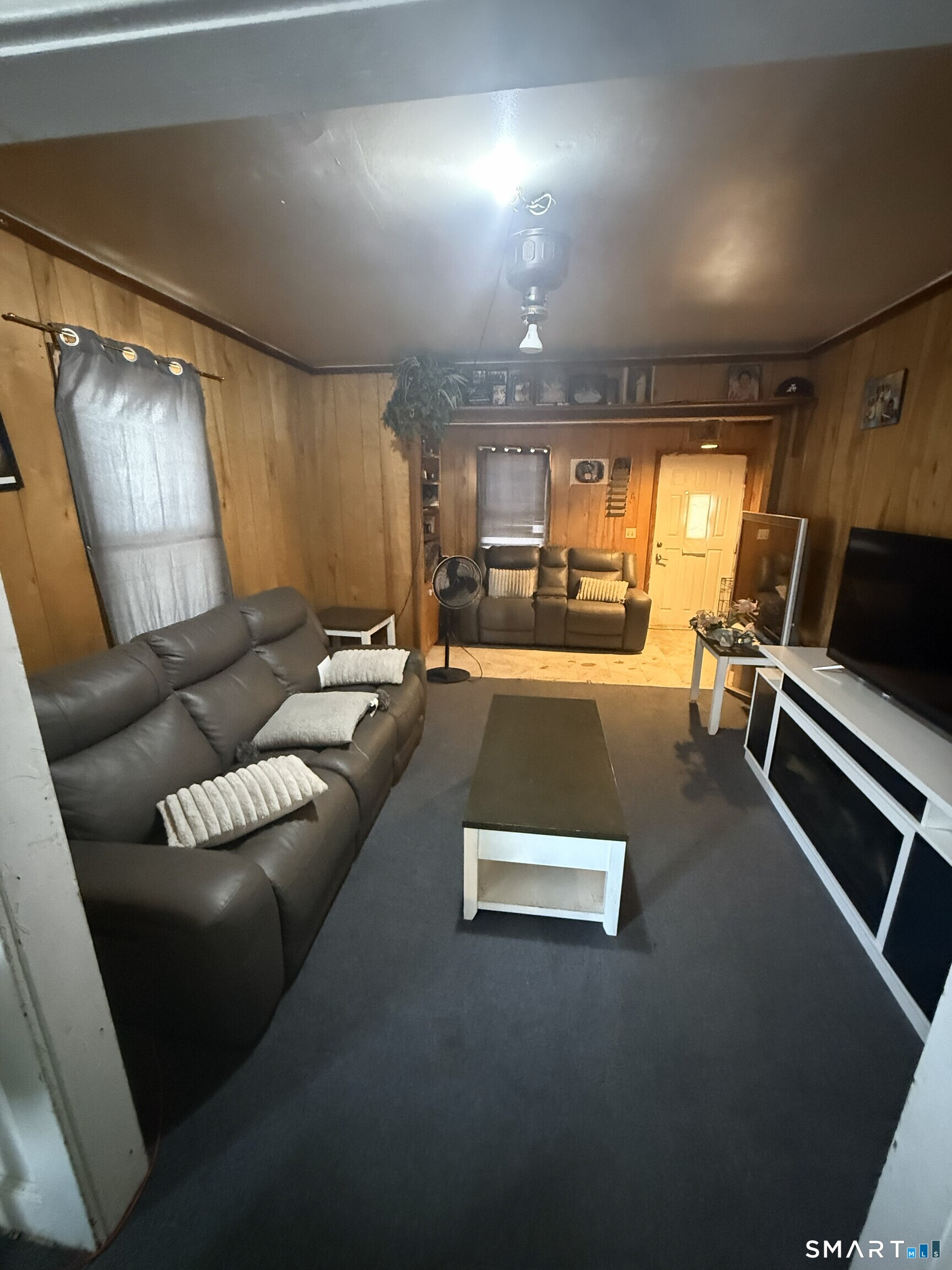 75 Frank Street Stamford, CT 06902 - Photo 3 of 21 a view of a room with gym equipment