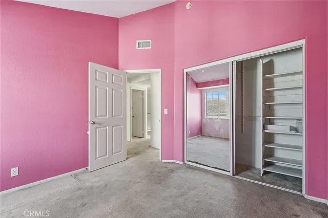 a view of empty room with windows