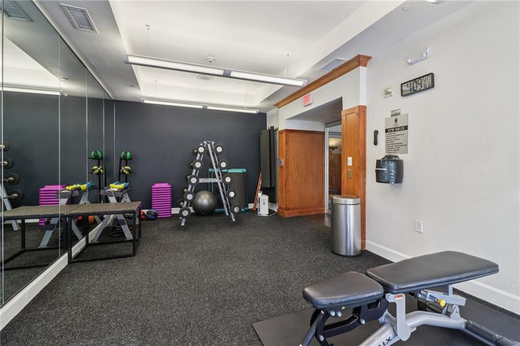 3445 Stratford Road Northeast, Unit 2602 Atlanta, GA 30326 - Photo 15 of 56 a view of a room with gym equipment