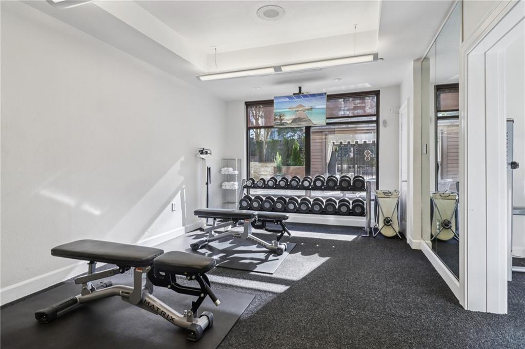 3445 Stratford Road Northeast, Unit 2602 Atlanta, GA 30326 - Photo 16 of 56 a view of a room with gym equipment