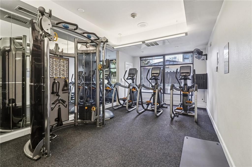 3445 Stratford Road Northeast, Unit 2602 Atlanta, GA 30326 - Photo 18 of 56 a view of a room with gym equipment