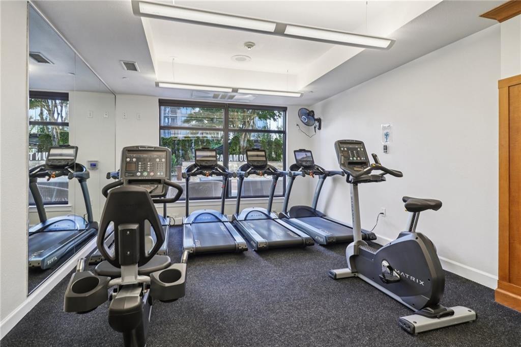 3445 Stratford Road Northeast, Unit 2602 Atlanta, GA 30326 - Photo 19 of 56 a view of a room with gym equipment