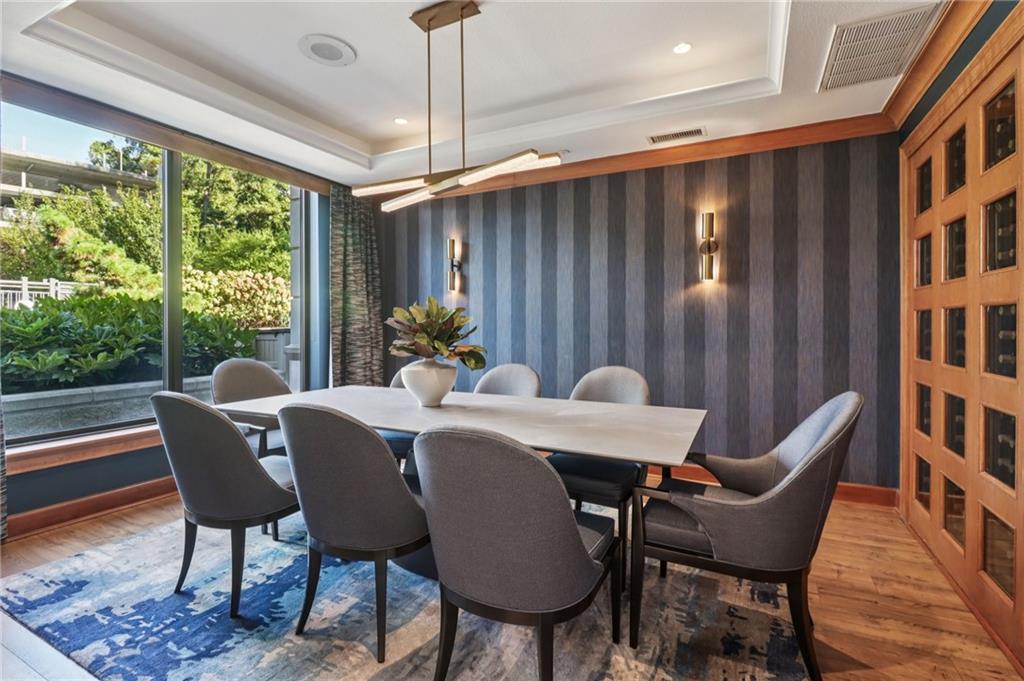 3445 Stratford Road Northeast, Unit 2602 Atlanta, GA 30326 - Photo 25 of 56 a view of a dining room with furniture window and outside view