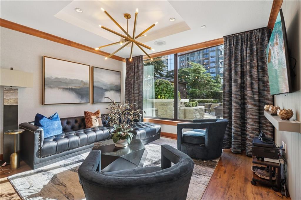 3445 Stratford Road Northeast, Unit 2602 Atlanta, GA 30326 - Photo 26 of 56 a living room with furniture and a large window