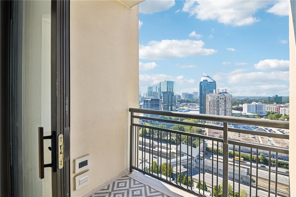 3445 Stratford Road Northeast, Unit 2602 Atlanta, GA 30326 - Photo 27 of 56 a view of a city from a balcony