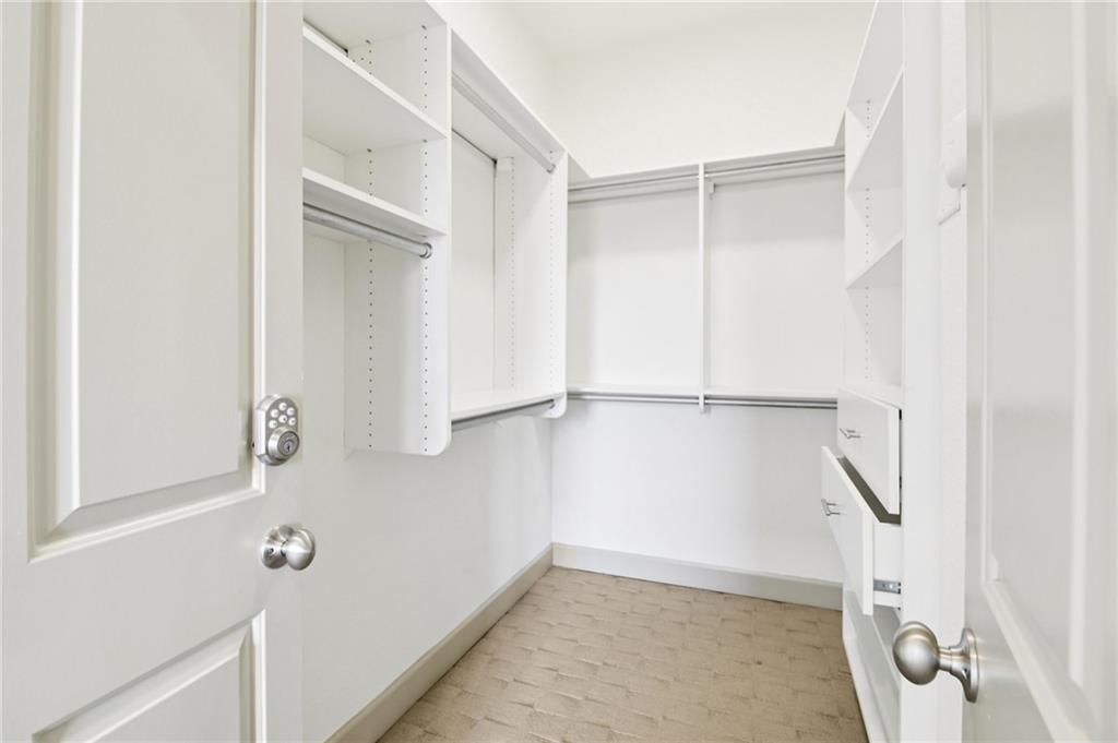 3445 Stratford Road Northeast, Unit 2602 Atlanta, GA 30326 - Photo 31 of 56 a view of an empty walk in closet