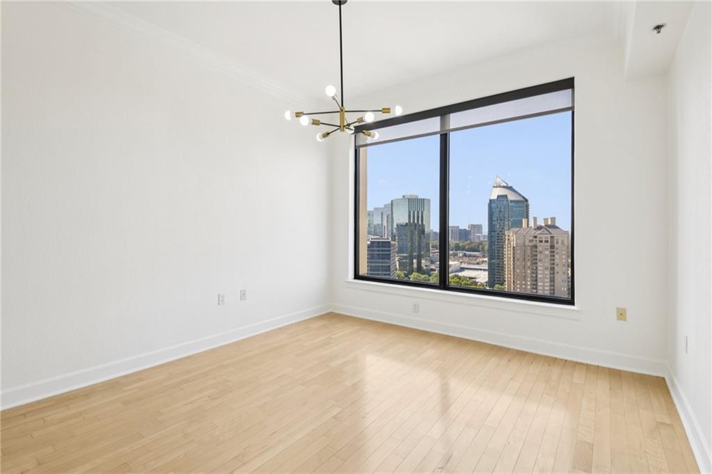 3445 Stratford Road Northeast, Unit 2602 Atlanta, GA 30326 - Photo 38 of 56 a view of a room with a large window and tub
