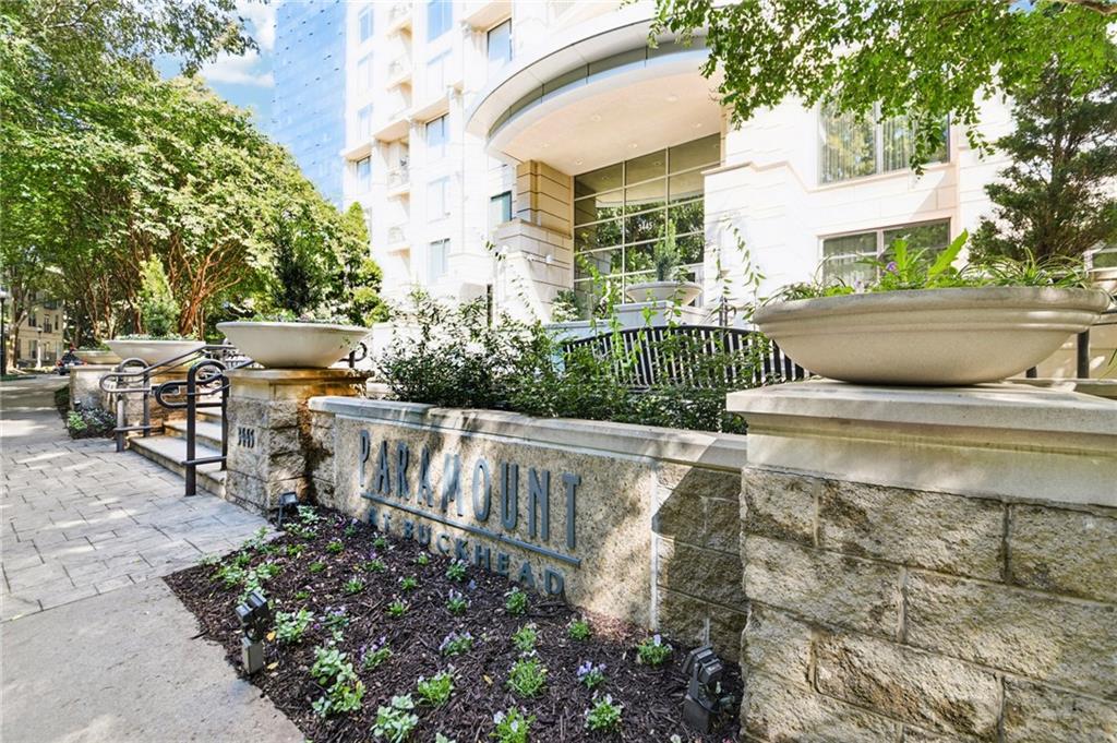 3445 Stratford Road Northeast, Unit 2602 Atlanta, GA 30326 - Photo 51 of 56 a view of a swimming pool with lawn chairs and plants