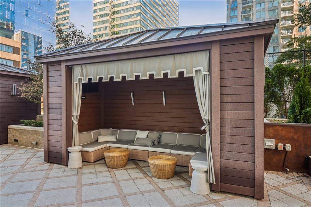 3445 Stratford Road Northeast, Unit 2602 Atlanta, GA 30326 - Photo 8 of 56 a front view of a house with