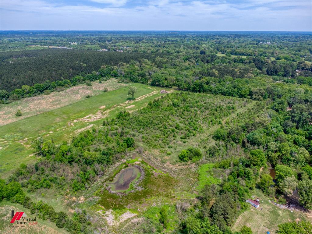 0 Colworth Place Keithville, LA 71047 - Photo 3 of 14 a view of a lush green outdoor space with a lake view