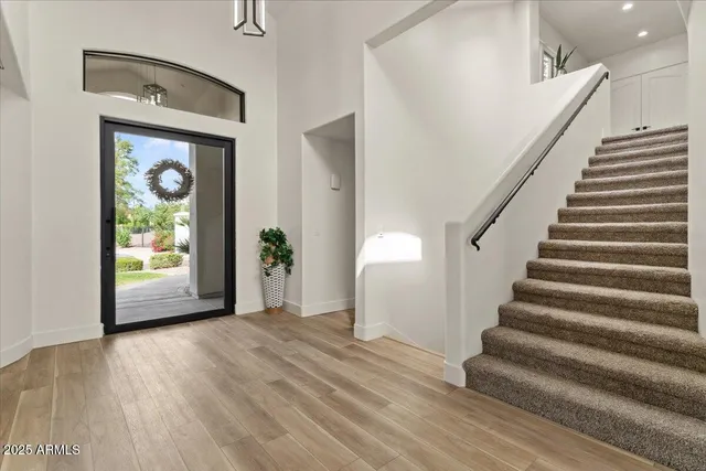 a kitchen with stainless steel appliances a stove top oven and sink