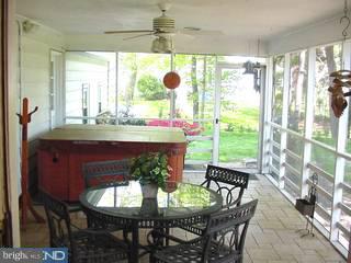 33 Quaker Road West Windsor, NJ 08550 - Photo 5 of 6 a view of a dining room with furniture and a window