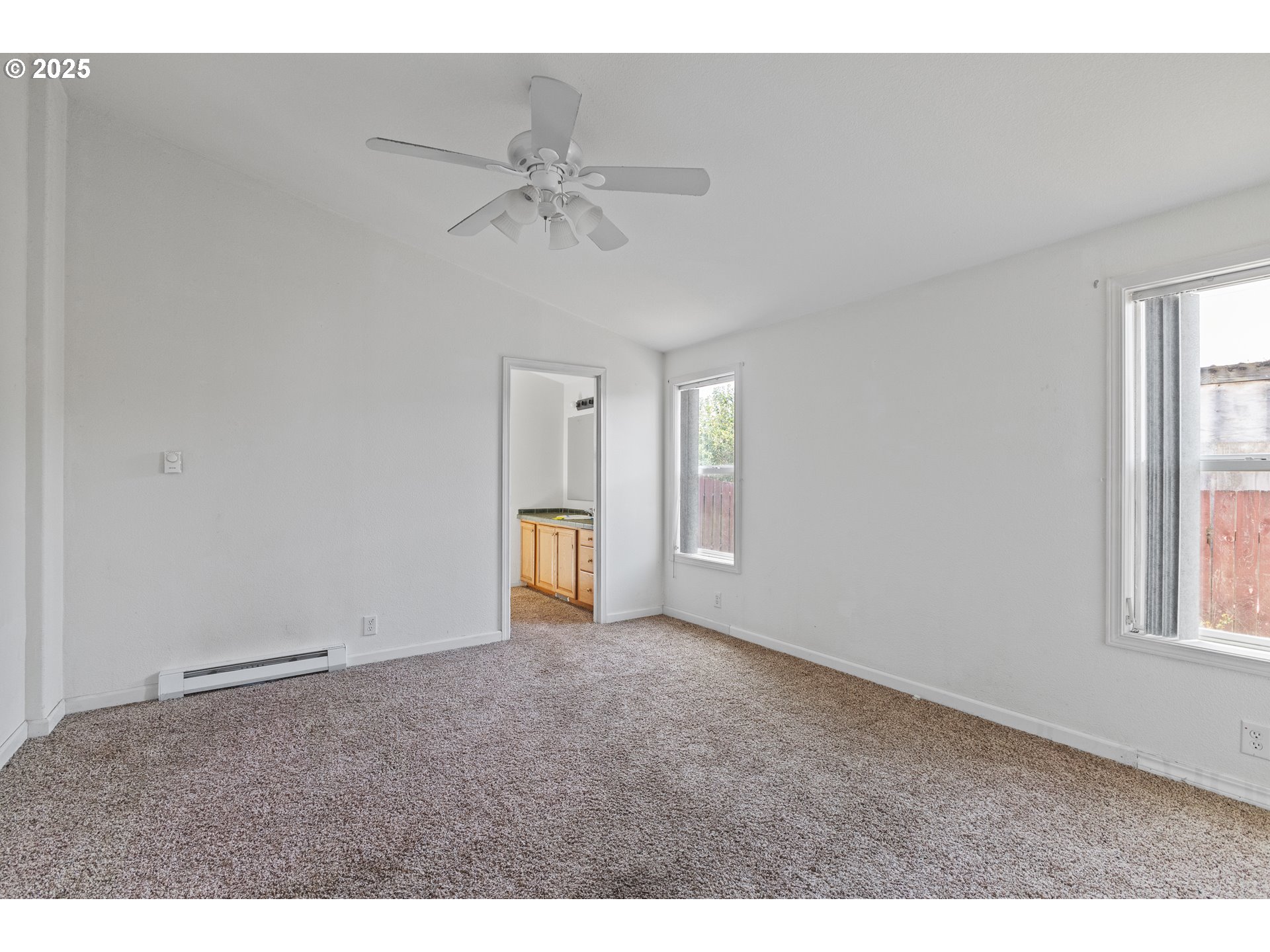 1829 East Willow Street Myrtle Point, OR 97458 - Photo 22 of 37 a view of an empty room with a window